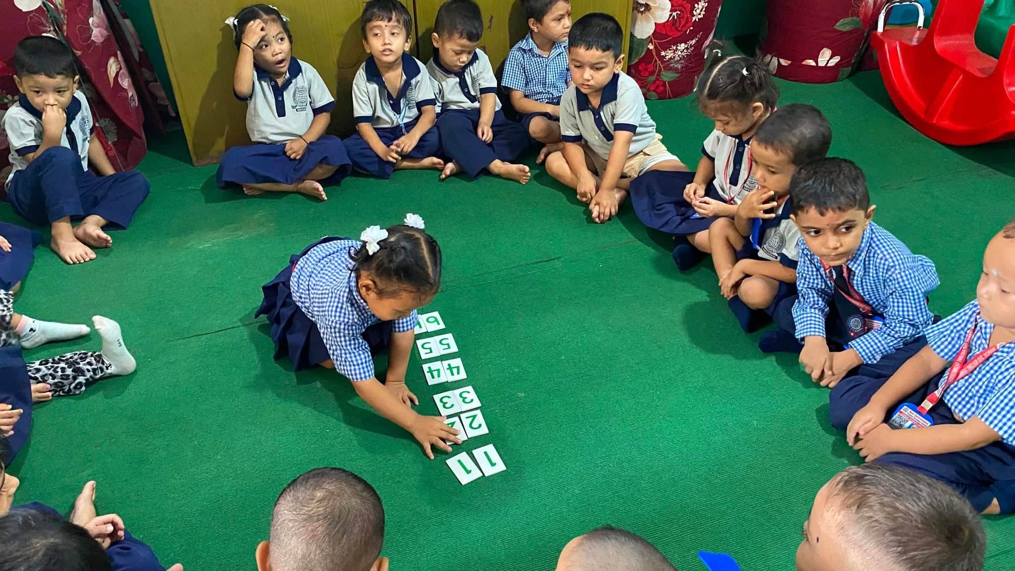 Children using Montessori materials