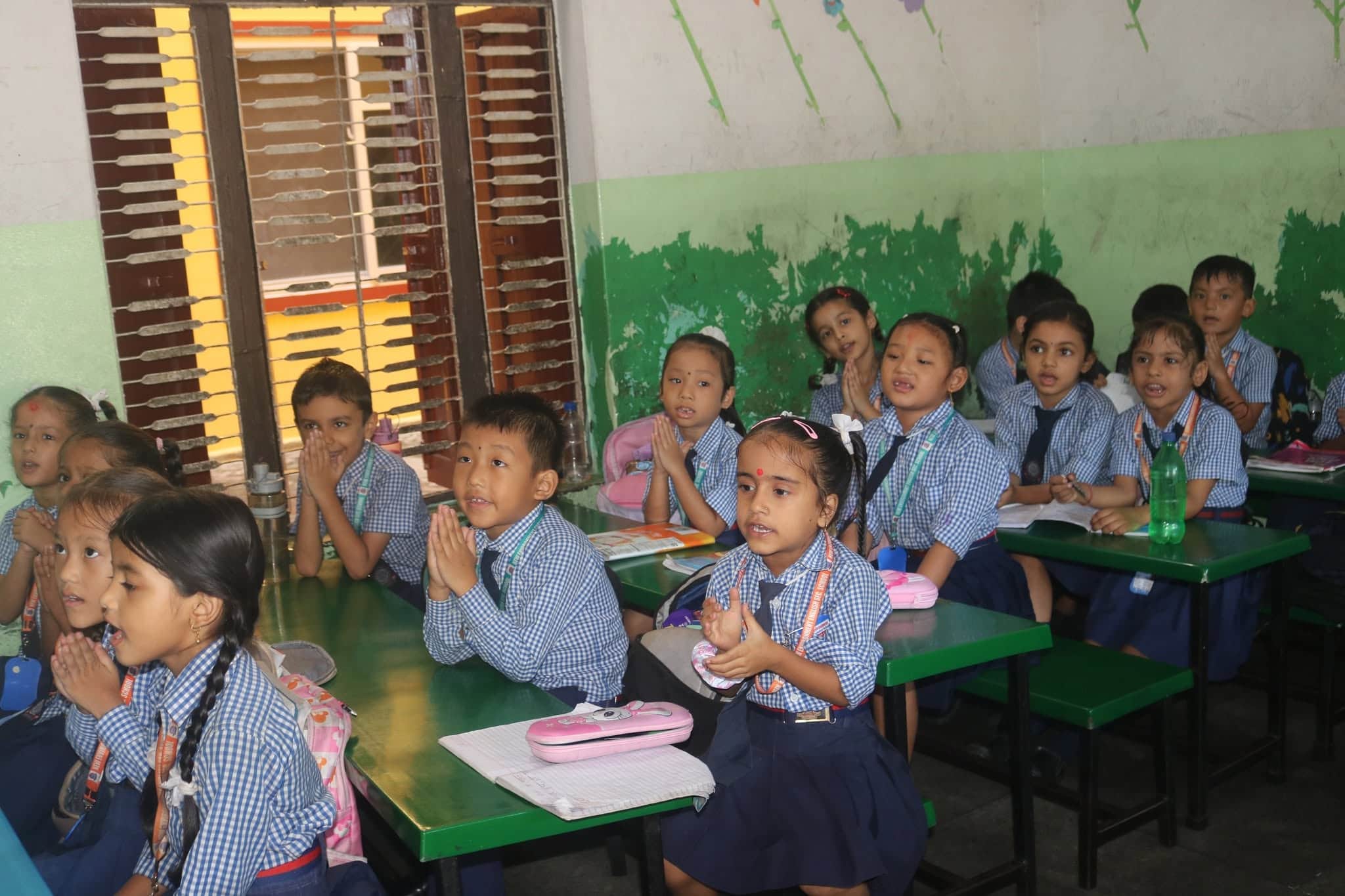 Montessori children learning through play at NEESS